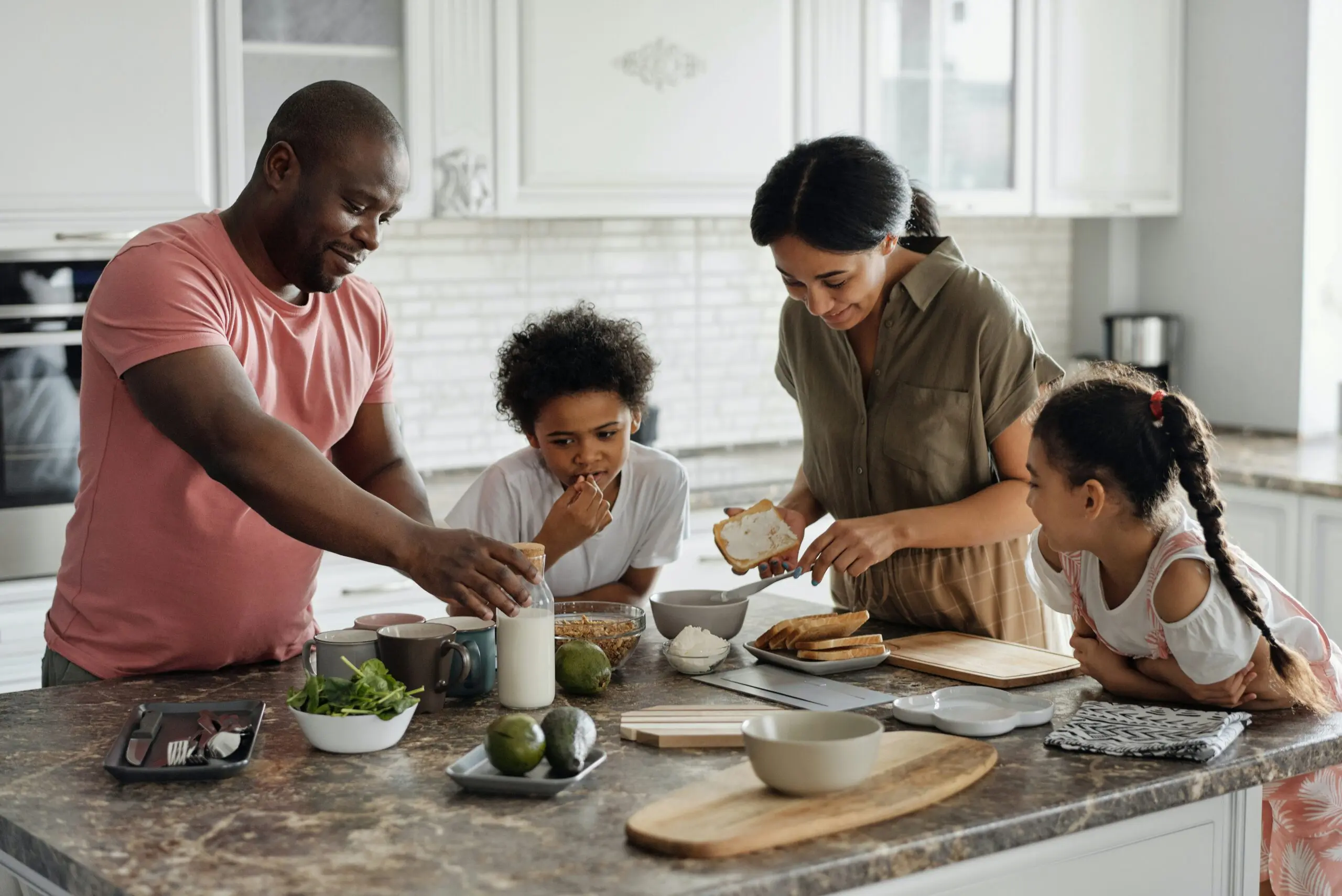 family in the kitchen cooking